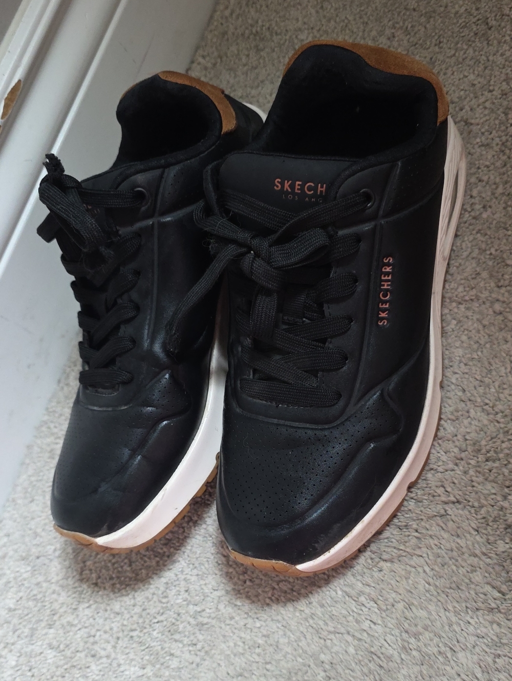 Skechers Black Sneakers with White Midsole and Tan Accents